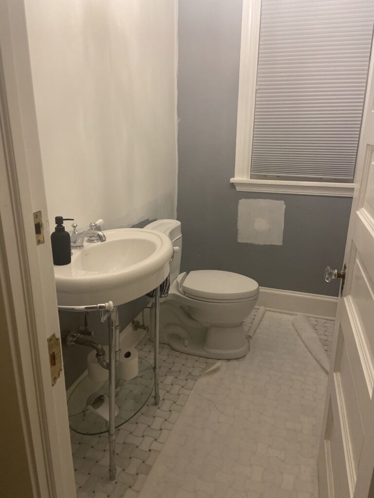 Before photo of powder bath in 1890 Queen Anne Victorian home in Chicago