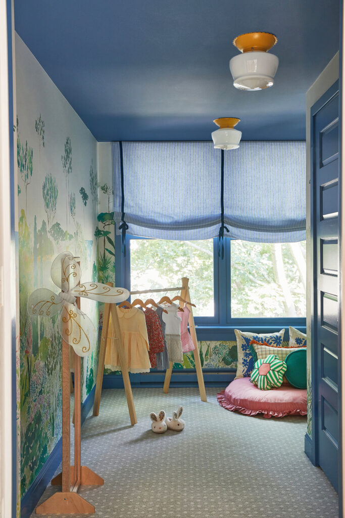 A little girl's dream dress-up nook, which was once a sleeping porch in a historic Chicago home.