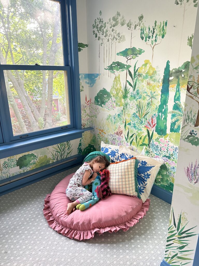 Whimsical and colorful interior design for a little girl's bedroom nook.