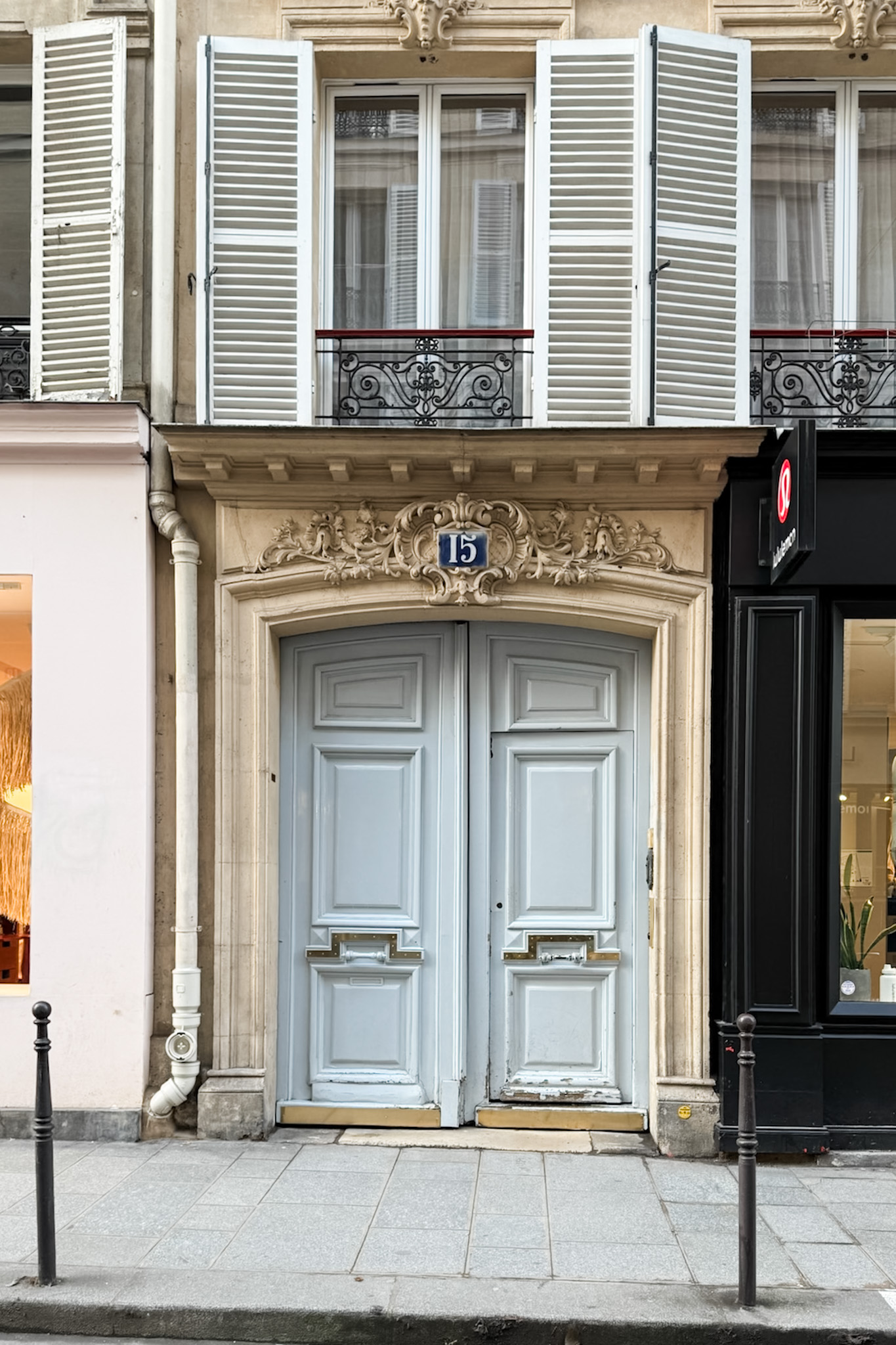 ornate Parisian door and architecture with patina